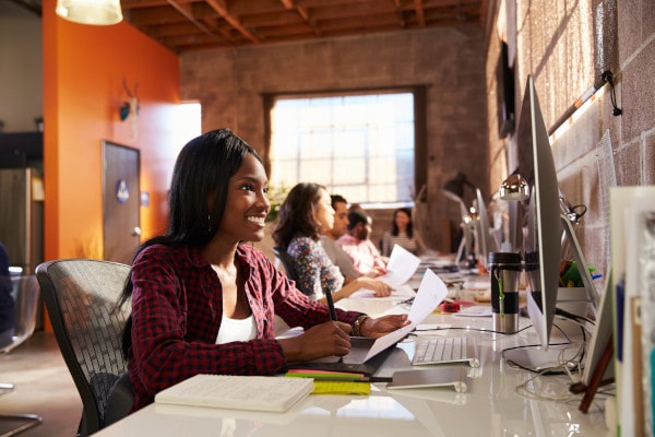 woman sat at computer